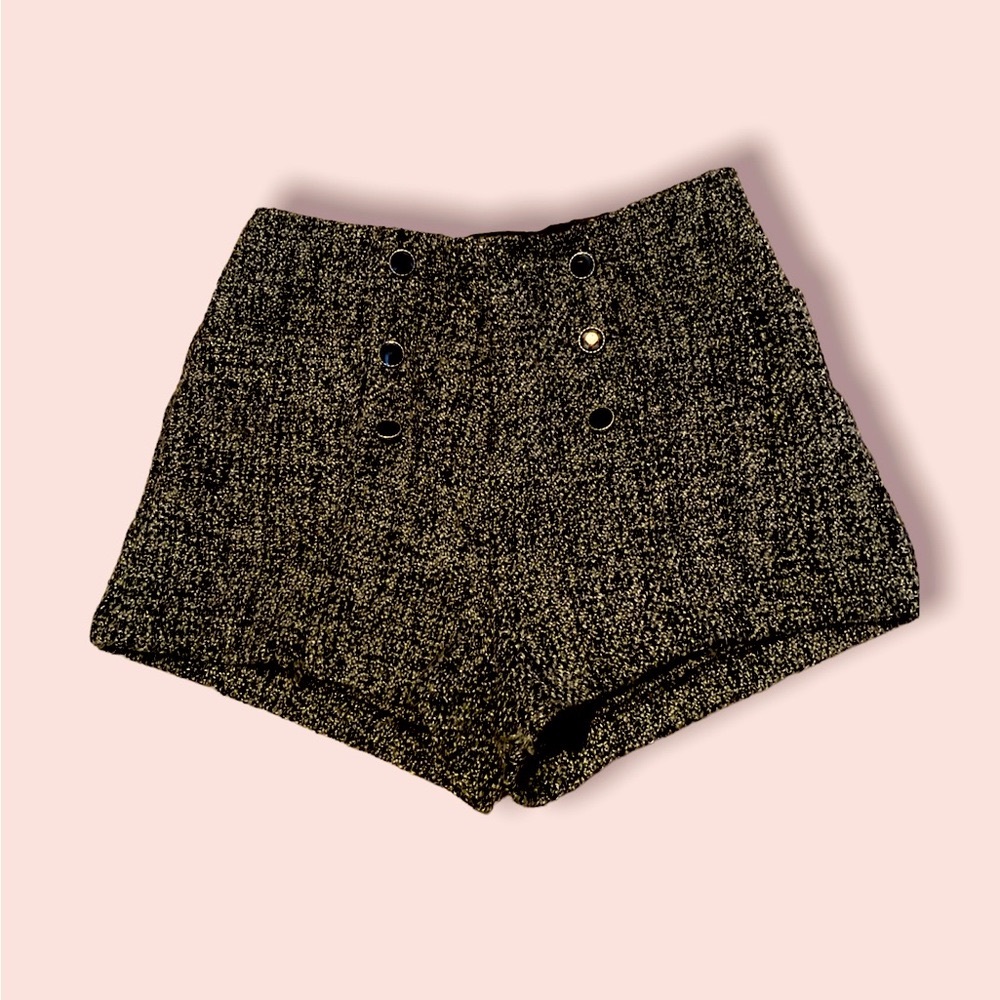 Shorts with button detail. Very cute. Casual or dressy.